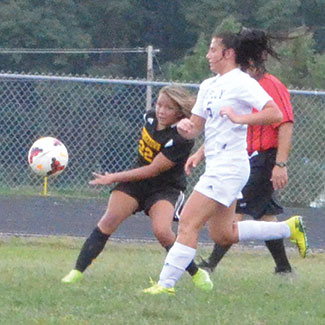 Georgetown’s Amaya Lovell fires off a shot through Ripley defenders during the Lady G-Men’s Sept. 10 win. 