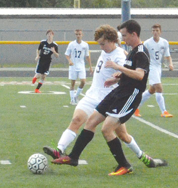 Western Brown’s Wesley O’Hara defends against a Little Miami attacker during a non-league contest at Kibler Stadium/LaRosa’s Field. 
